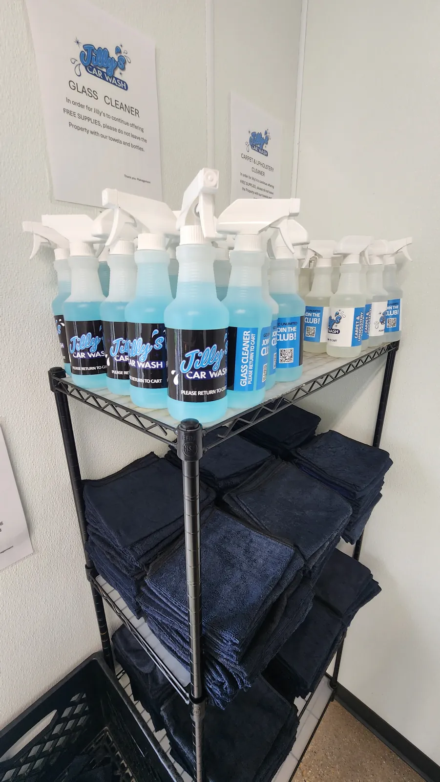 Free towels and cleaning supplies station at Jilly's Car Wash